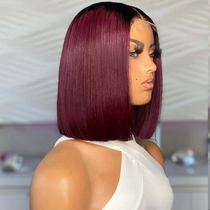 Model wearing 2×6 Bob straight lace closure wig in Burgundy Wine Red with natural dark roots, sleek middle part bob style.