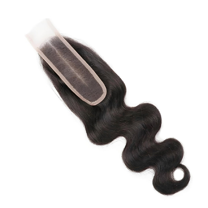 Top view of 2×6 body wave lace closure in natural color, showing lace grid and natural-looking part.
