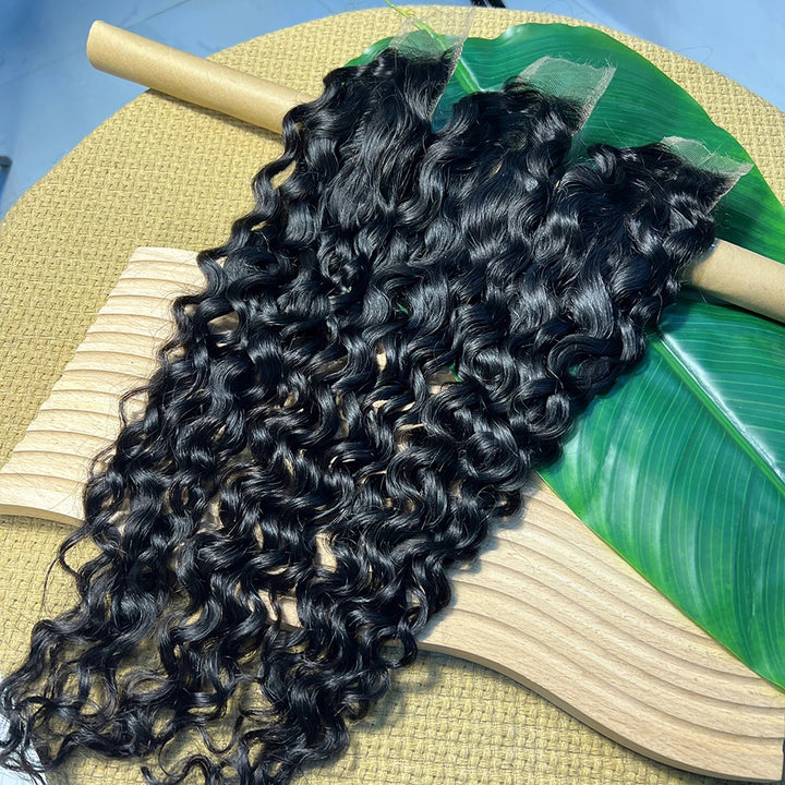 Full-length display of 2×6 water wave lace closures in natural color, showing wavy texture and lace base.