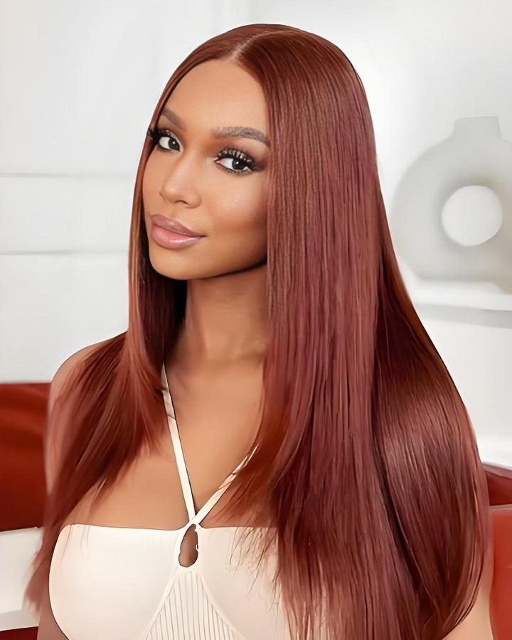 Model with smooth reddish brown EuxmeHair wig styled with center part, radiating a sleek and elegant finish.