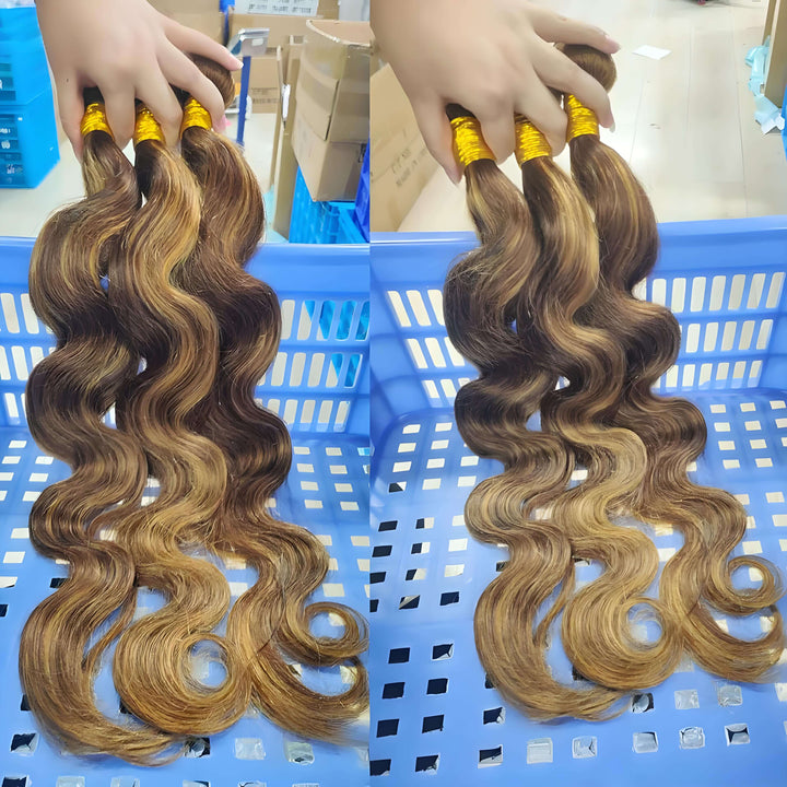 Multiple P4/27 body wave bundles in medium brown with honey blonde highlights placed in a basket, highlighting wave consistency and shine.