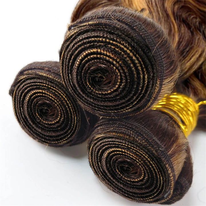 Close-up of P4/27 body wave hair bundle wefts, tightly stitched with durable double machine construction.