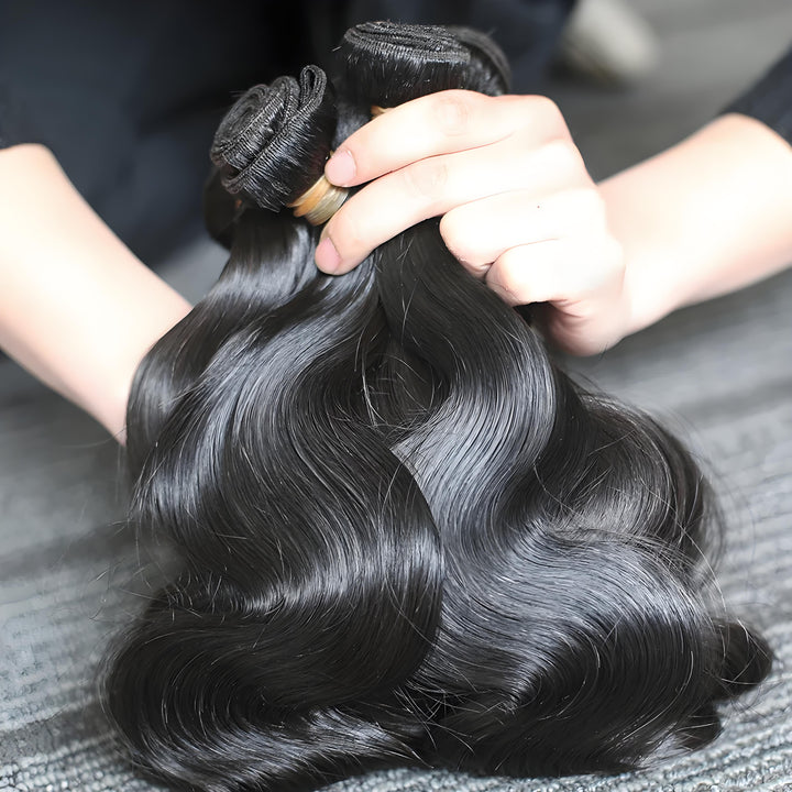 Side-by-side image showing a model with body wave hairstyle and three shiny bundles with deep S-wave curl pattern.
