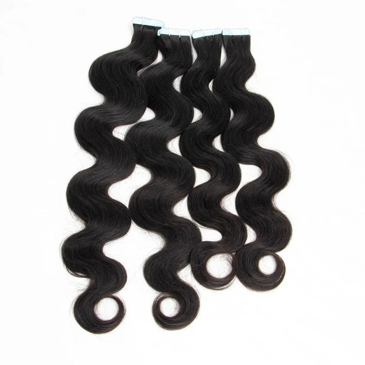 Close-up of blue adhesive tape tabs on body wave hair extensions for secure and reusable application.