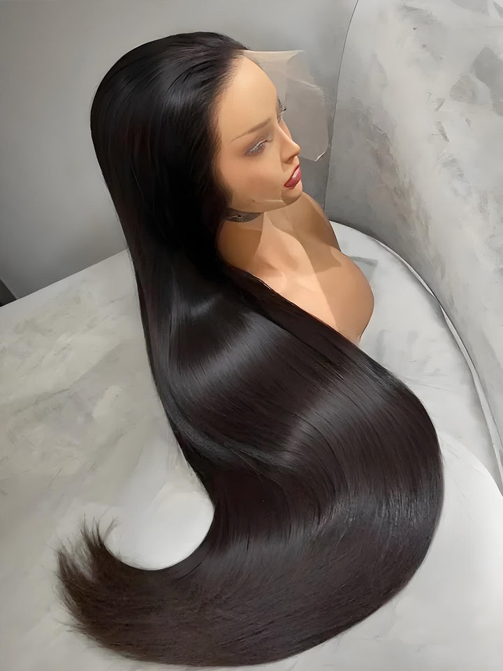 Side profile of long bone straight wig on mannequin, with natural color and soft sheen flowing across surface.