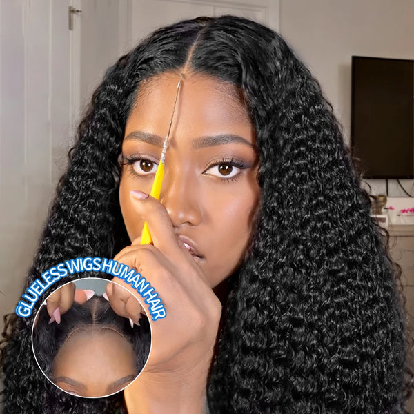 Close-up of woman styling deep wave lace closure wig with middle part, highlighting natural hairline and realistic lace blend.