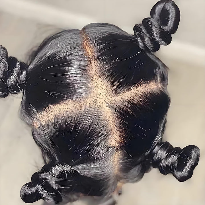 Overhead close-up of straight full lace wig showing clean cross-grid parting and smooth scalp illusion.
