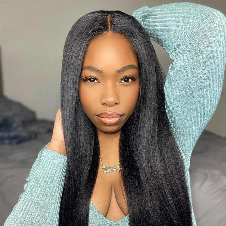 Model wearing long-length Yaki straight full lace wig in natural color with center part and silky flow.
