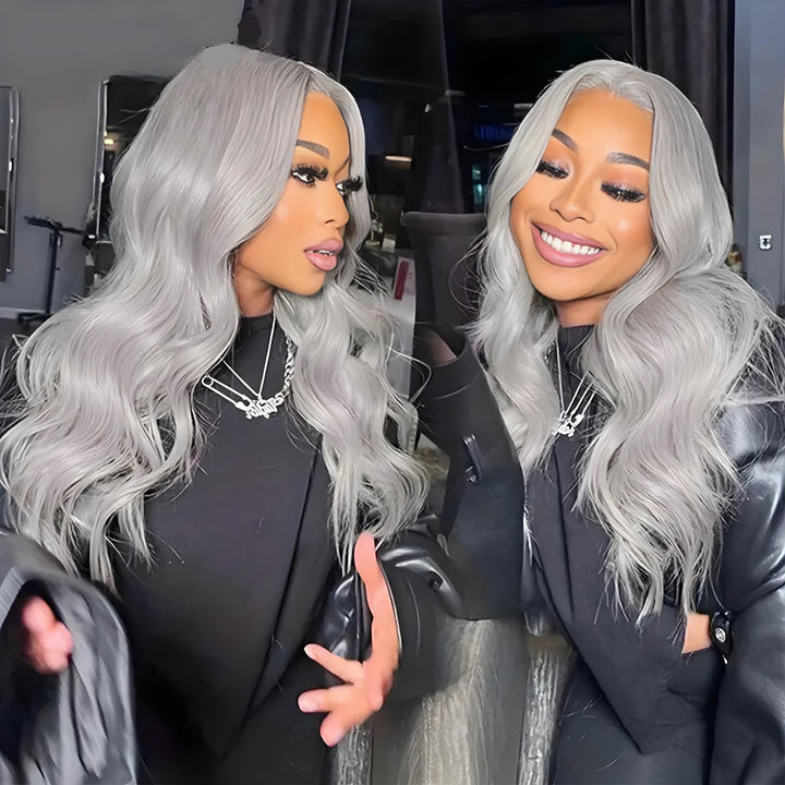 Side-by-side images of a model with long grey body wave hair wearing black outfits, showing movement and shine.
