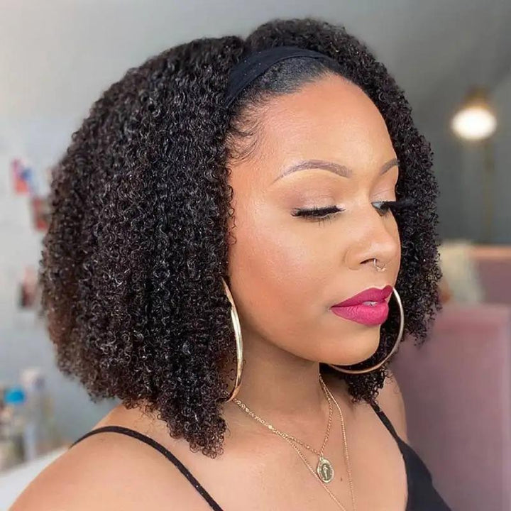 Side profile of model wearing natural color Afro Curly headband wig, showing tight curls and natural hairline.