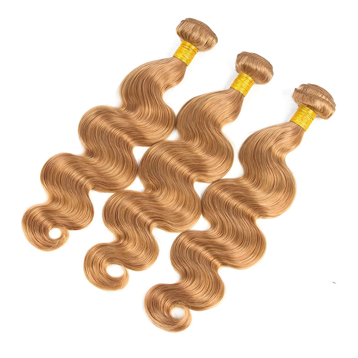 Three bundles of honey blonde body wave human hair, silky waves with golden blonde color and healthy sheen.