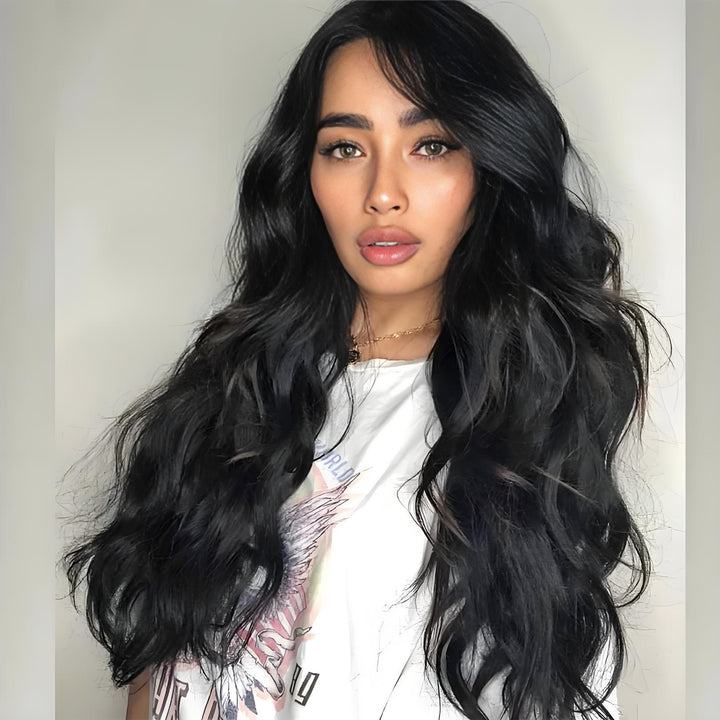 Front-facing model with voluminous EuxmeHair I-tip extensions, styled in flowing body wave curls.