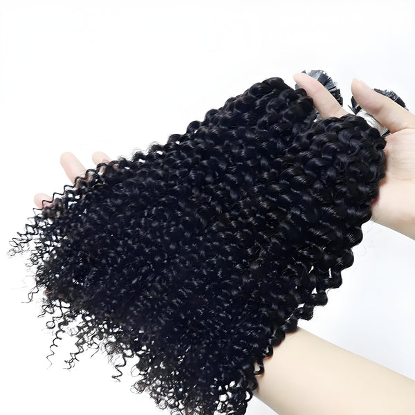 Close-up of EuxmeHair I Tip Kinky Curly bundle held in hand, showing dense root to tip fullness and defined curl texture.