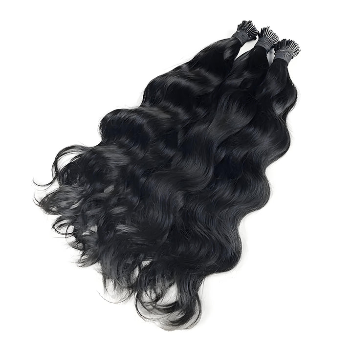 Side-by-side comparison of EuxmeHair Natural Wave and Kinky Curly I Tip Extensions to show curl pattern differences.