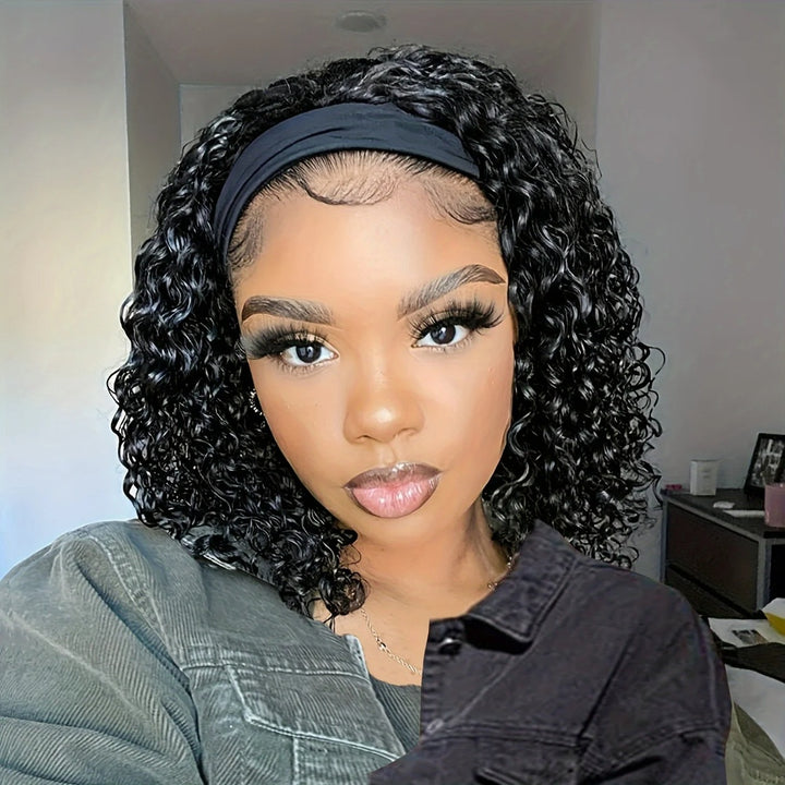 Close-up of model wearing kinky curly bob wig with natural hairline and black headband, showcasing defined curls.