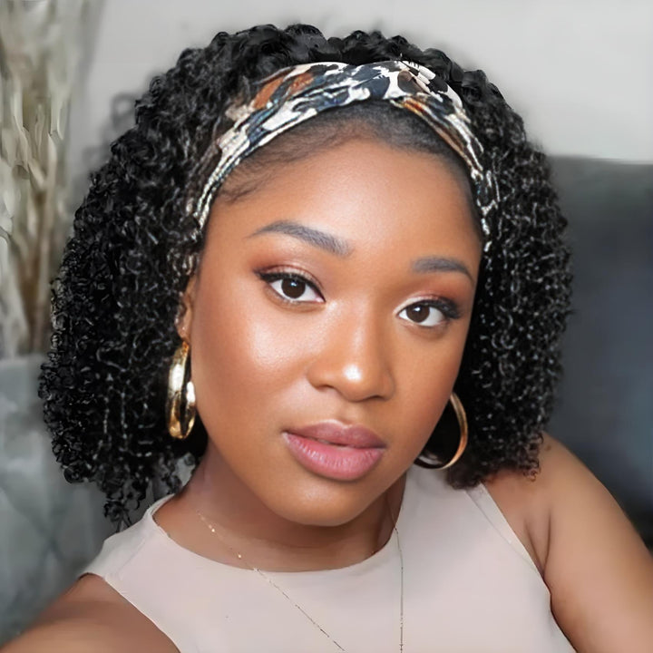 Kinky curly bob wig styled with cheetah-print headband, soft ringlet curls and elegant indoor lighting.