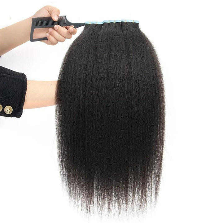 Kinky straight tape-in hair lifted with comb, displaying thickness, fullness, and natural texture.