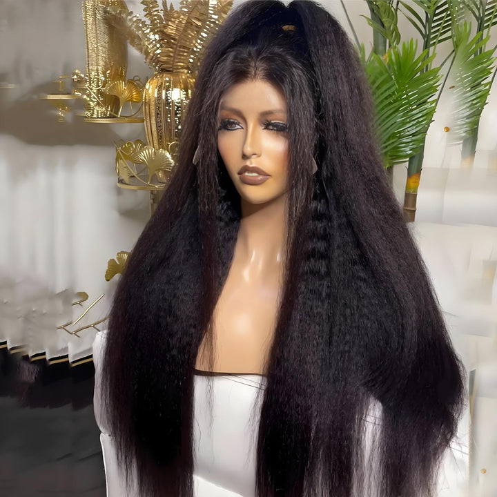 Mannequin head with ultra-long kinky straight wig, partial braiding, and full volume finish.