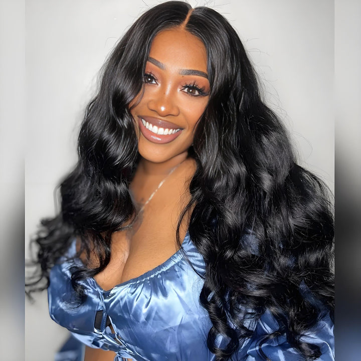 Smiling woman with EuxmeHair 5x5 lace closure body wave wig in natural black virgin human hair