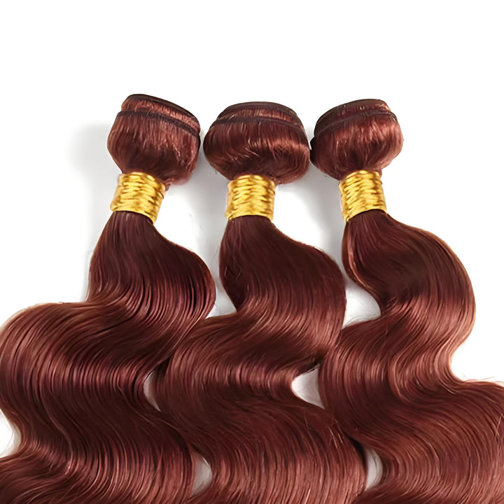 Three EuxmeHair reddish brown body wave hair bundles with golden wraps, showcasing silky smooth texture.