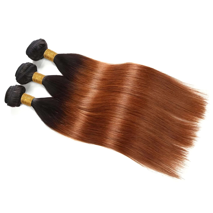 Three straight bundles in T1B/30 ombre laid side by side, showcasing seamless gradient from off black to auburn.