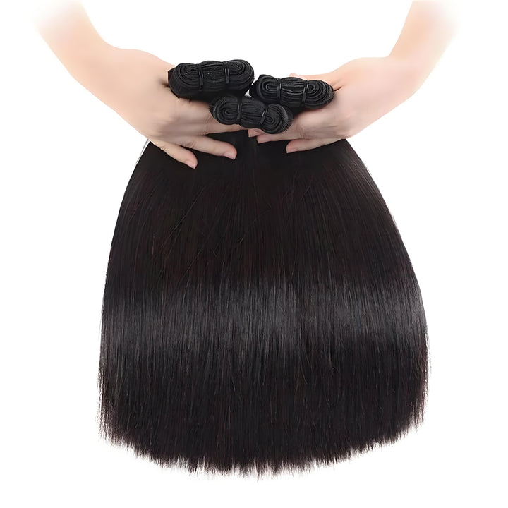 Close-up of four straight hair bundles laid flat to show full ends and uniform silky strands.