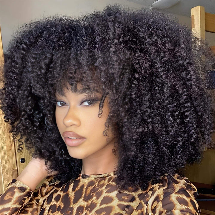 Afro curly V Part wig in natural color styled with frontal bangs for a full, textured Afro look.