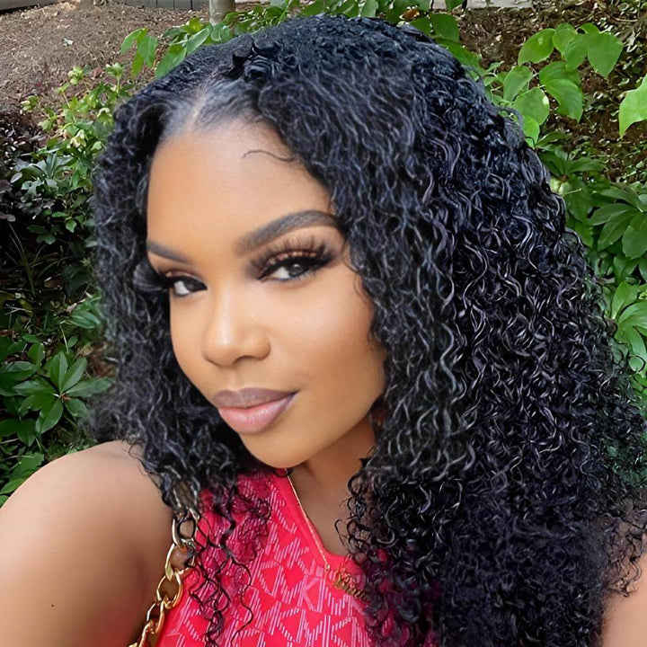 Kinky curly V Part wig in natural color shown outdoors on model, highlighting natural curls and realistic hairline.