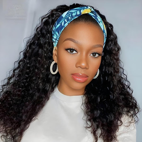Woman wearing water wave headband wig with blue patterned band, showing natural curls and volume.
