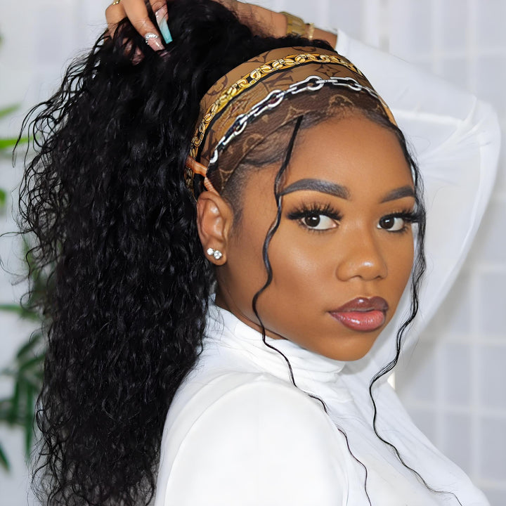 Water wave headband wig styled in high ponytail with scarf-patterned headband and soft defined curls.