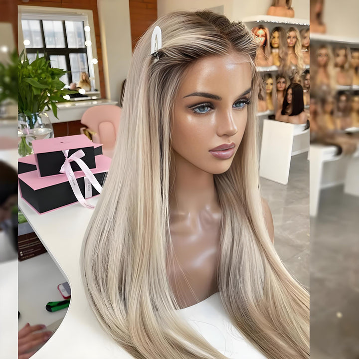 Close-up of a mannequin wearing a platinum-highlighted lace wig in straight texture, clipped at front to show realistic parting and lace.