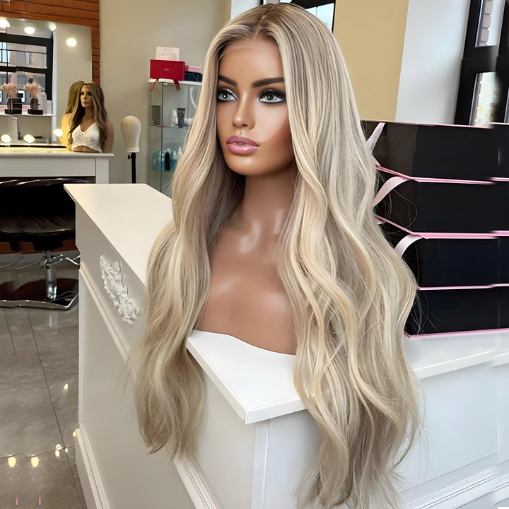 Side view of a body wave blonde brown wig on mannequin placed in a salon showroom setting.